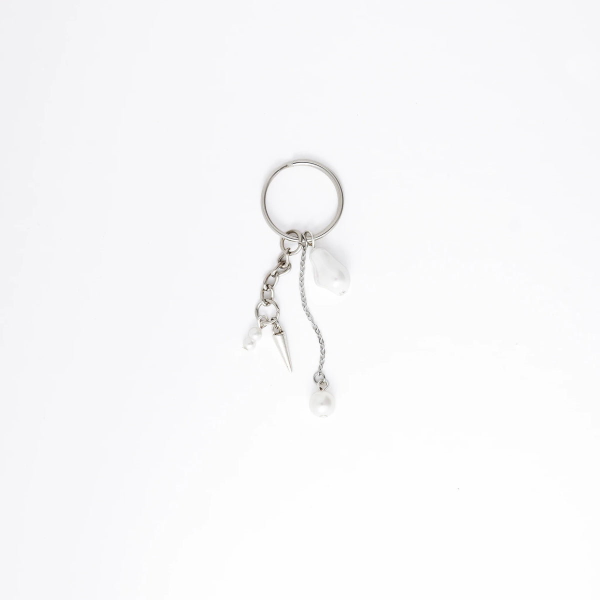 Silver keychain with a small dagger charm on a white background