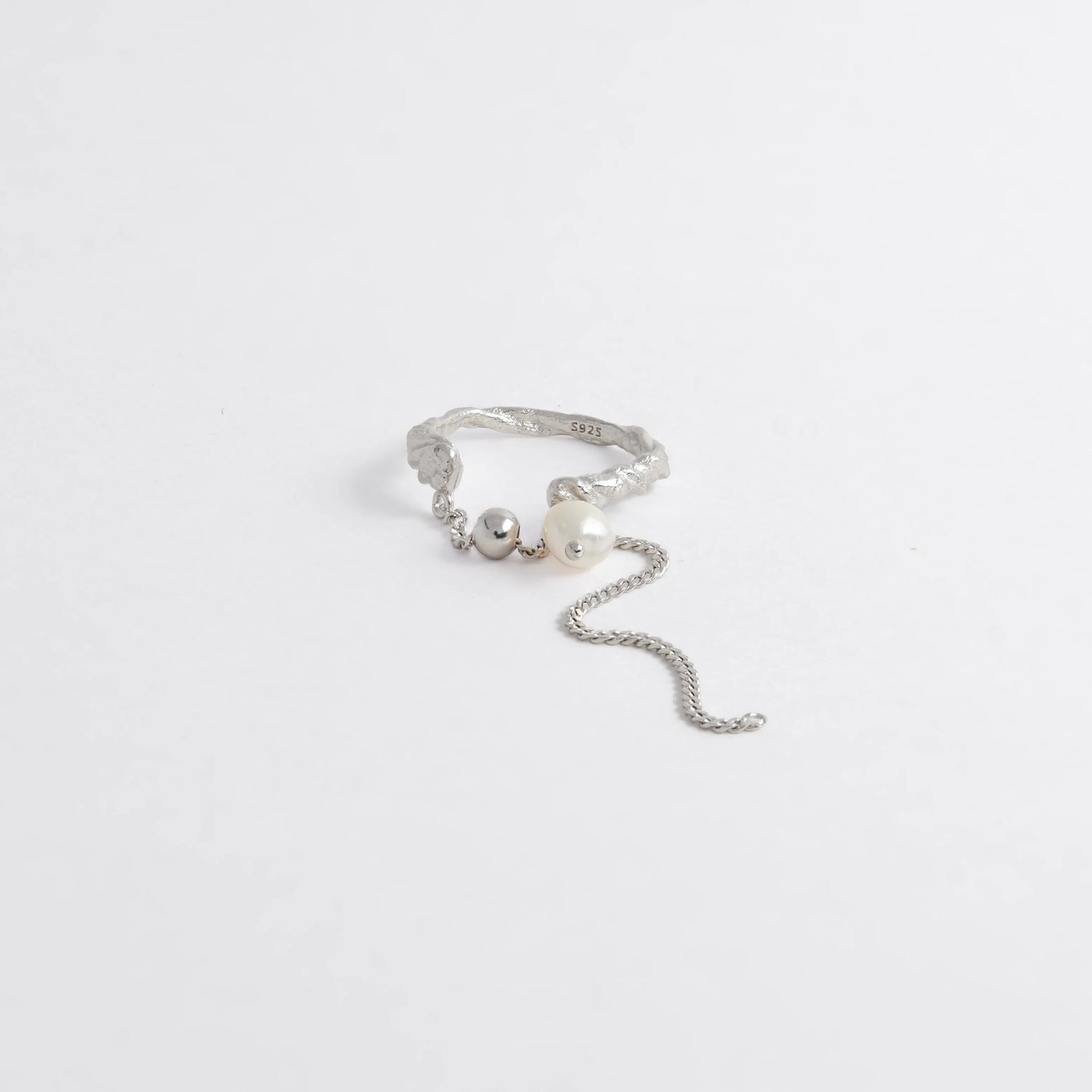 Silver ring with chain and pearl charm