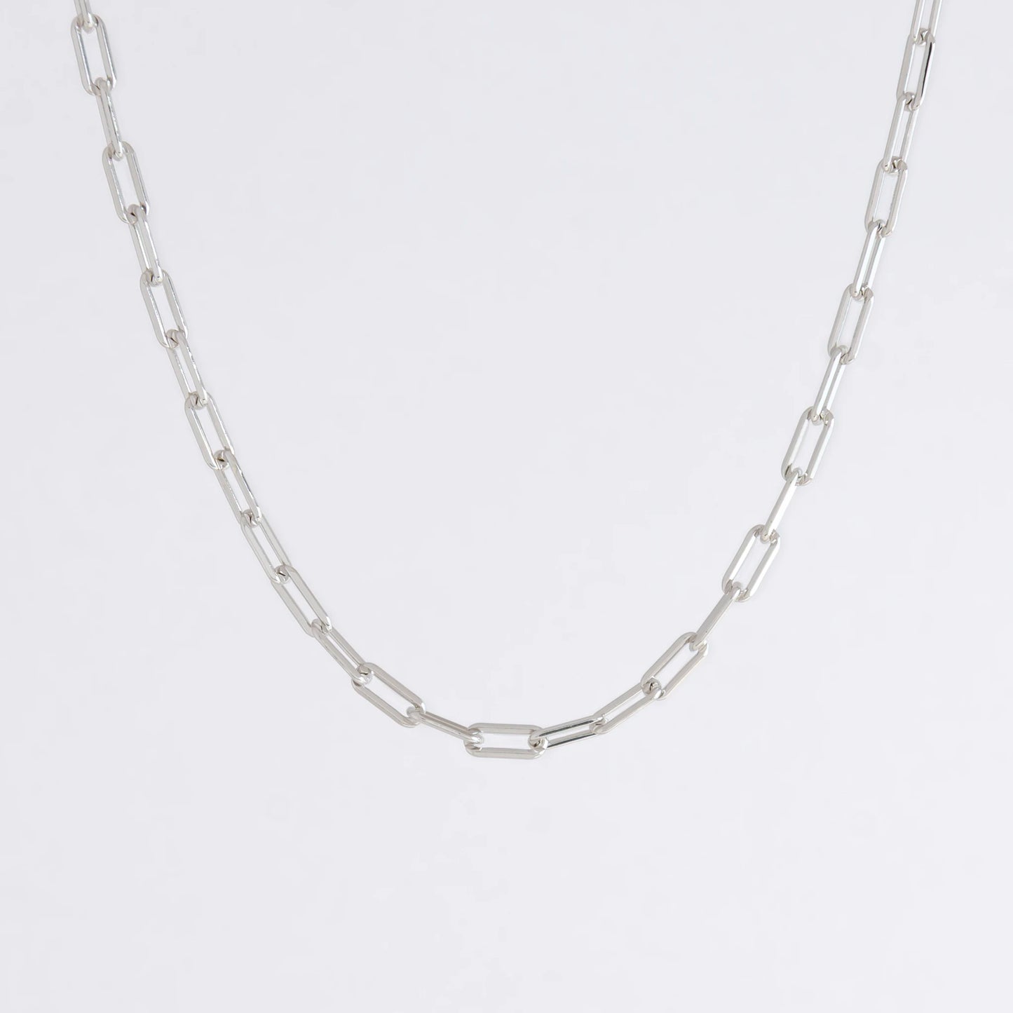 sterling silver paperclip necklace on a white background