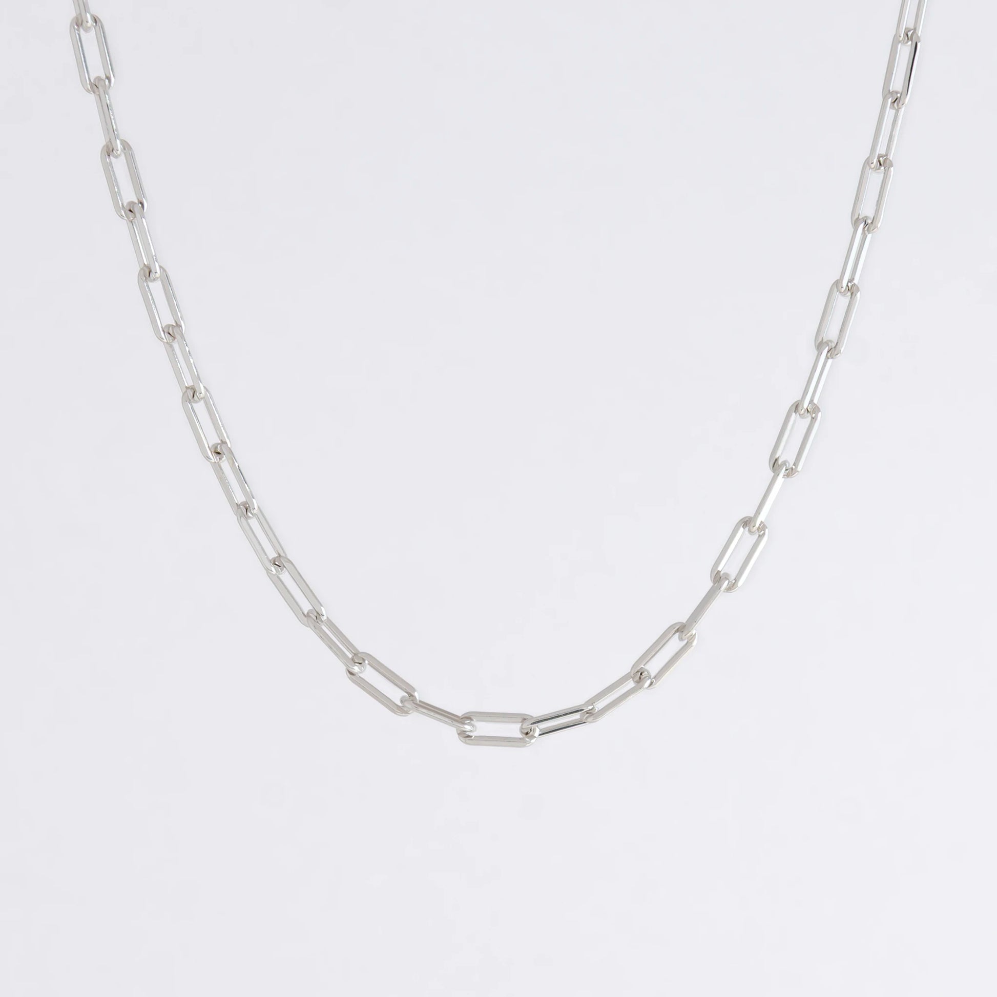 sterling silver paperclip necklace on a white background
