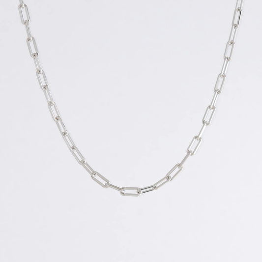 sterling silver paperclip necklace on a white background