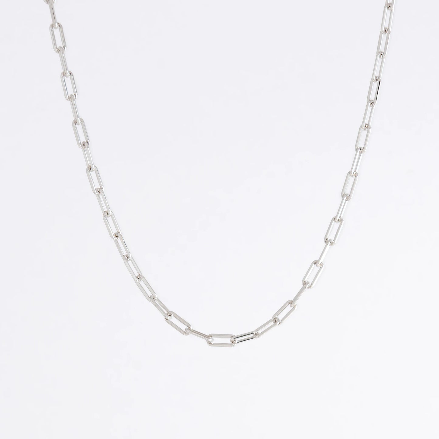 sterling silver paperclip necklace on a white background