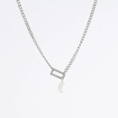 Silver necklace with a geometric shape and pearl pendant