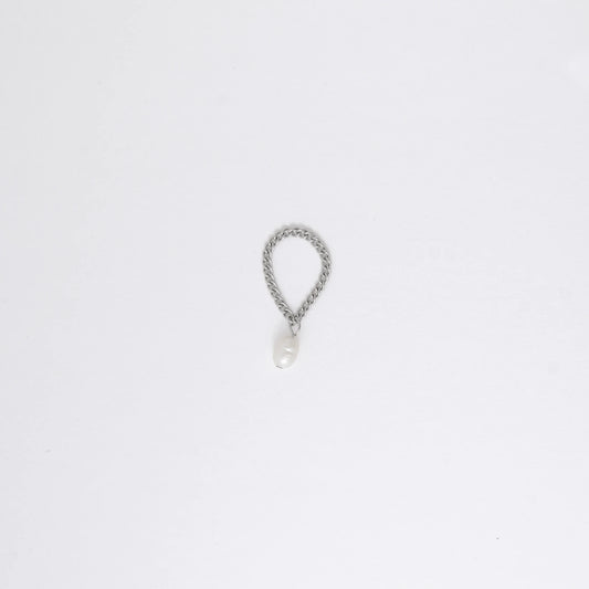 Silver stainless steel dainty chain ring with a pearl charm on a white background