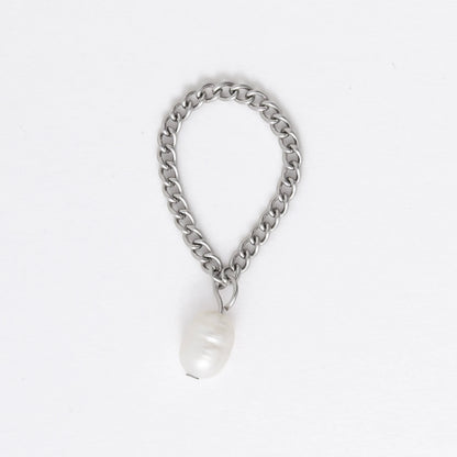 Silver stainless steel dainty chain ring with a pearl charm on a white background