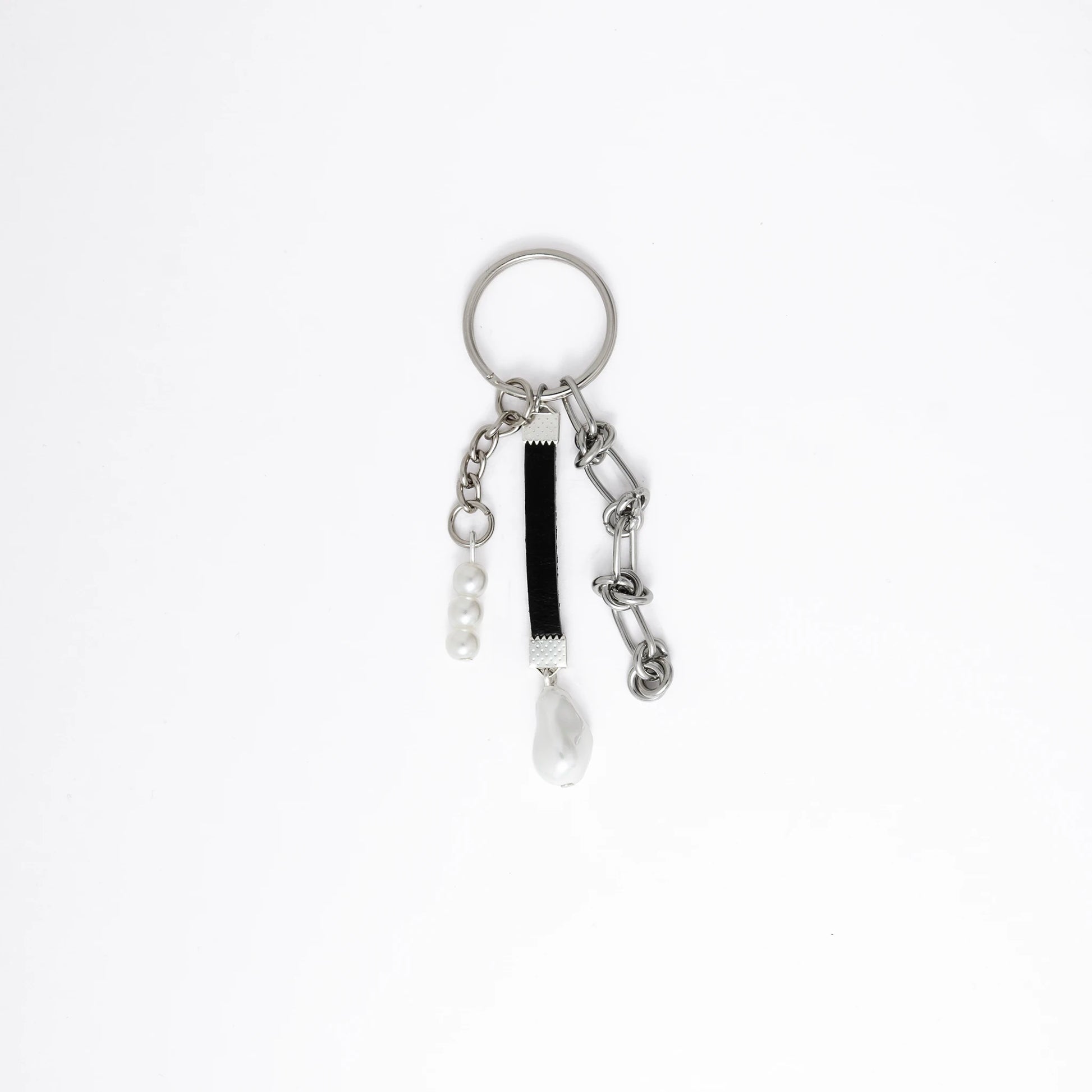Keychain with multiple charms on a white background