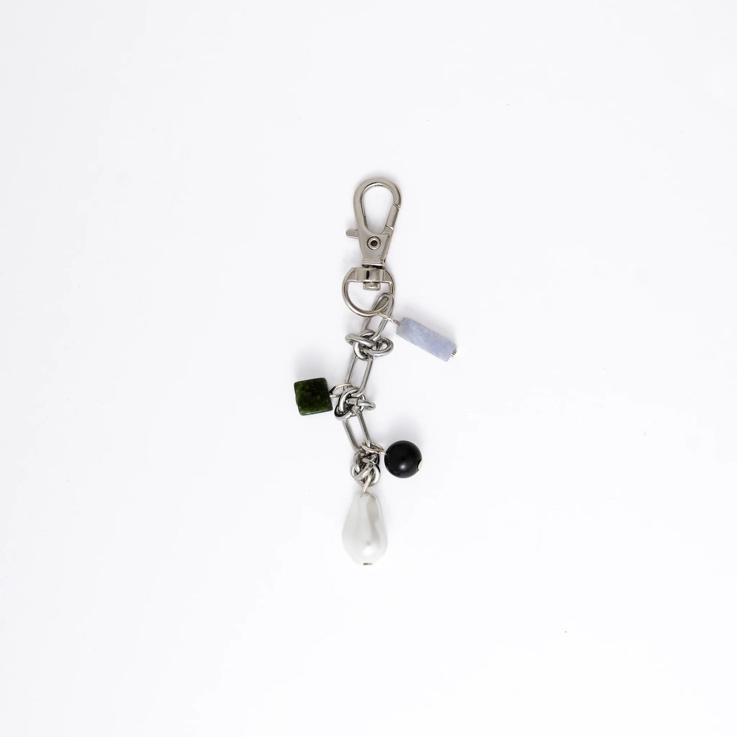 Keychain with various charms on a white background