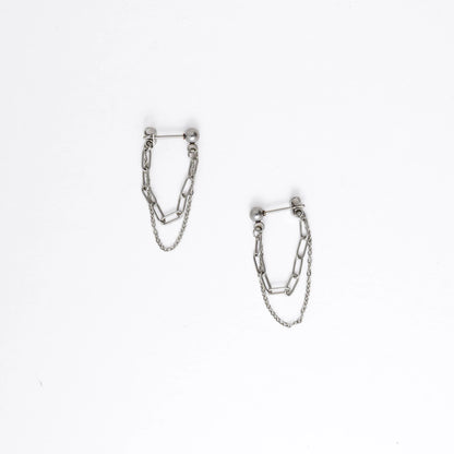 Pair of silver chain earrings on a white background