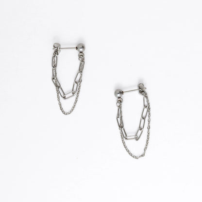 Pair of silver chain earrings on a white background