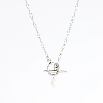 Silver necklace with a pearl pendant on a white background