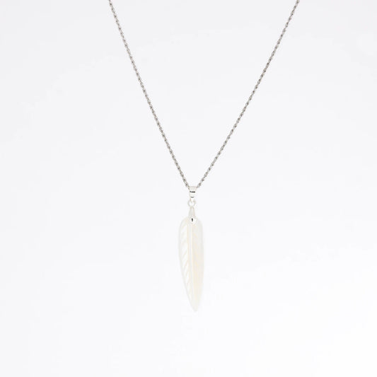 A delicate silver chain necklace featuring a small, stylized white feather pendant, shown against a plain white background.