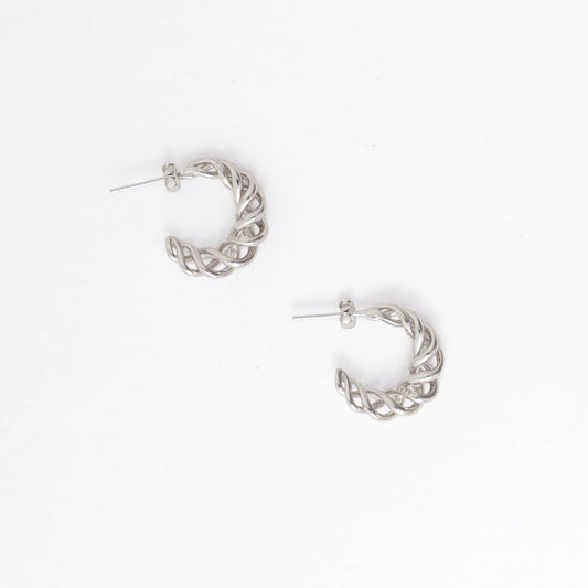 A pair of silver-toned twisted half-hoop earrings with post backs, displayed on a clean white background.